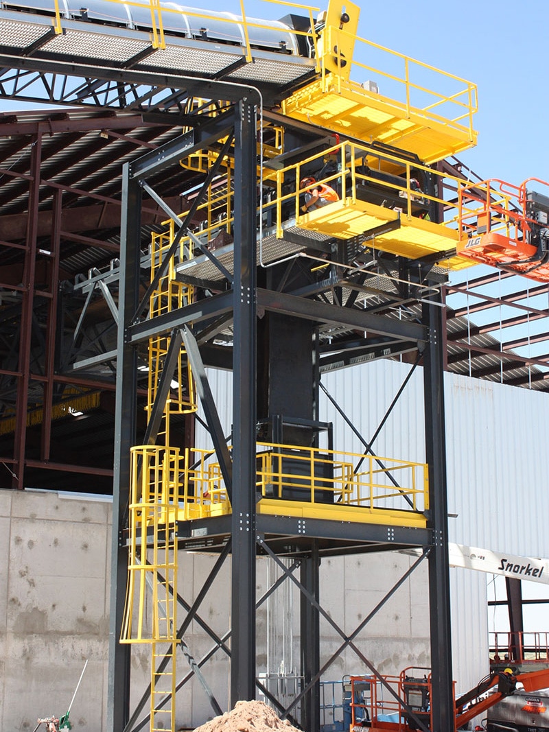 Towers with other manufacturing equipment installed at plant - Kase Conveyors