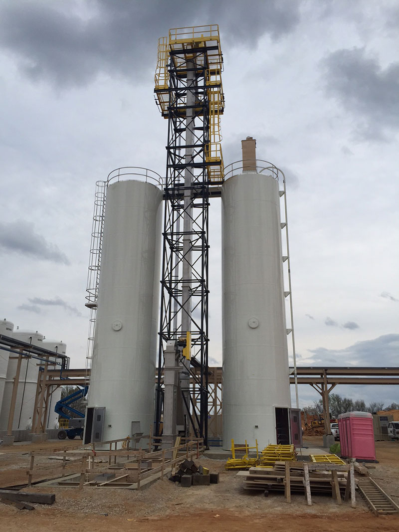 Towers with other manufacturing equipment installed at plant - Kase Conveyors